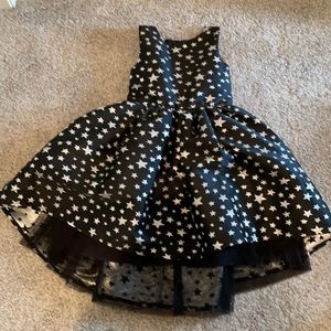 Girls Black and silver holiday dress with Silver stars Size 8-9 with lining